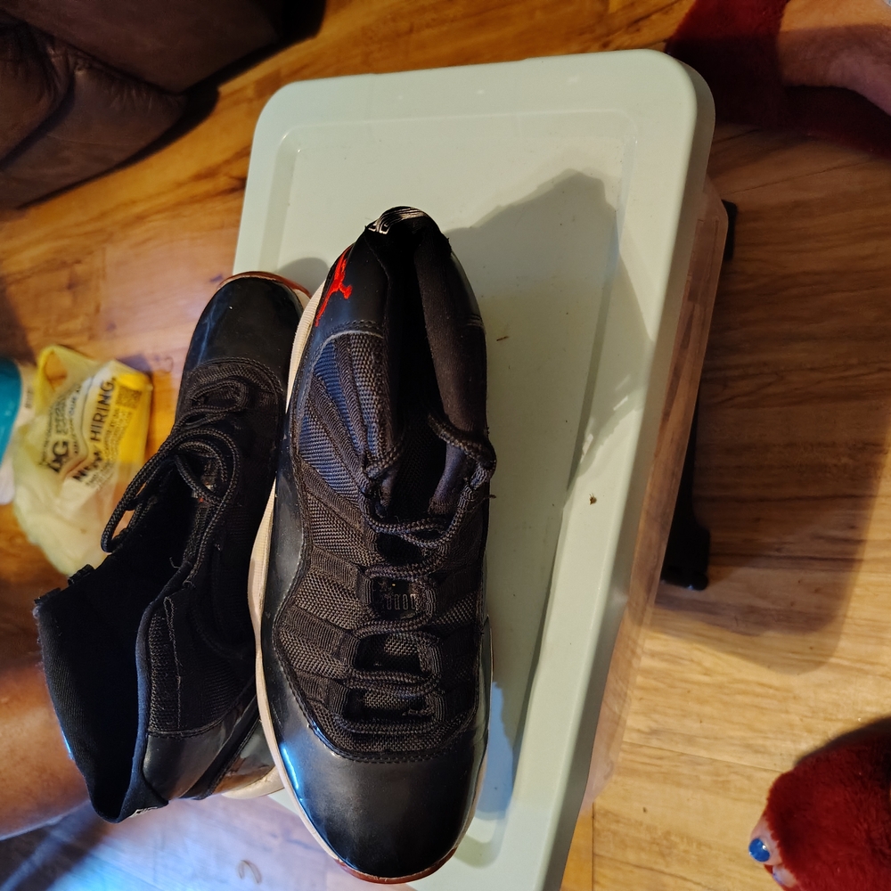 Black Sneakers with Red Details